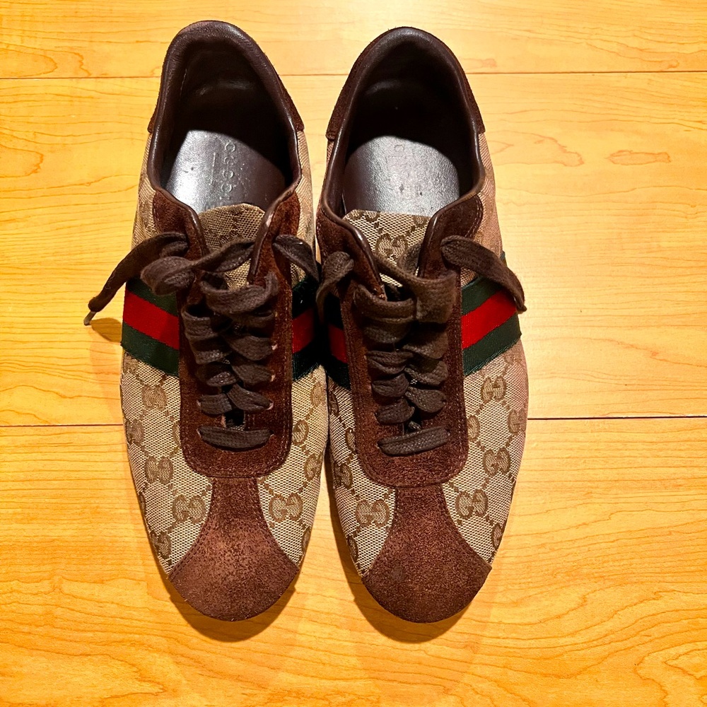 Authentic Gucci monogram sneakers .